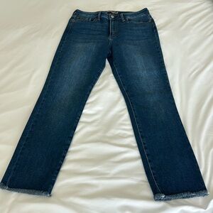 Dark washed cropped jeans with frayed bottom